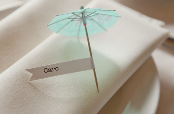 Cocktail umbrellas are perfect to be used as place card in place setting