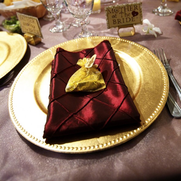 gold and crimson color makes a hot combination for the table decor