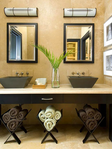 Use the open area under the sink to store, roll up towels and place them in contemporary wooden magazine racks