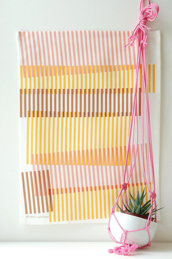 Kitchen can use light and bright linens such as these tea towel.