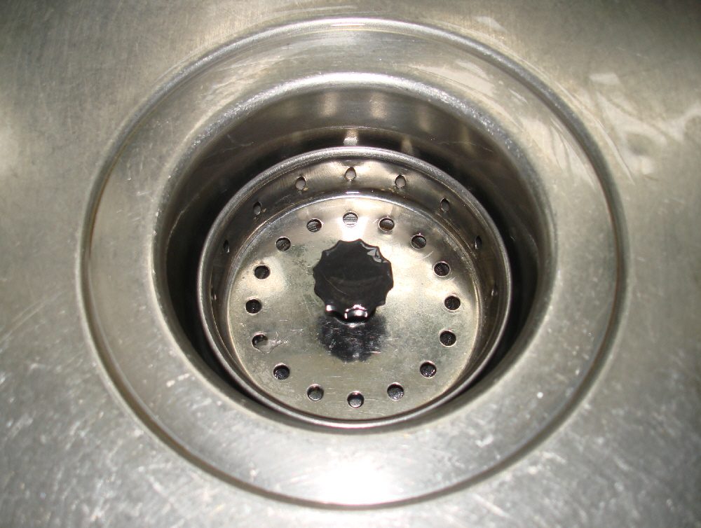 Why do drains gurgle and clear more slowly than usual?
