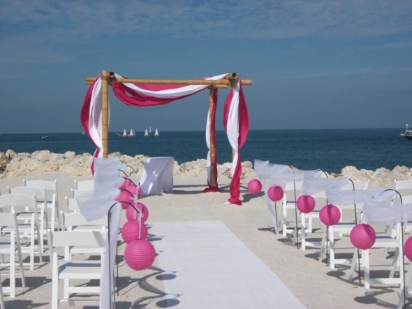 Beach wedding arches are great for guests to walk through and can serve as a backdrop during your ceremony. 