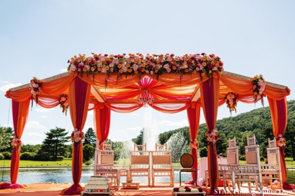 Fusion wedding altar/mandap brings a color splash to the setting.