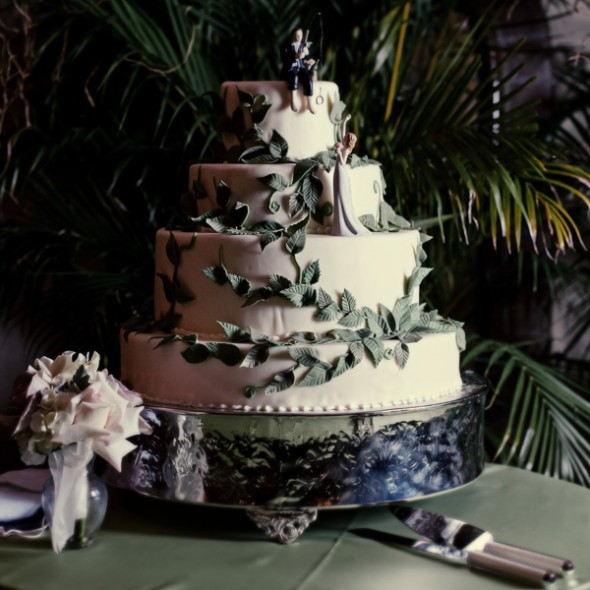 If the theme is rustic, fondant leaves add rustic charm to this elegant cake.