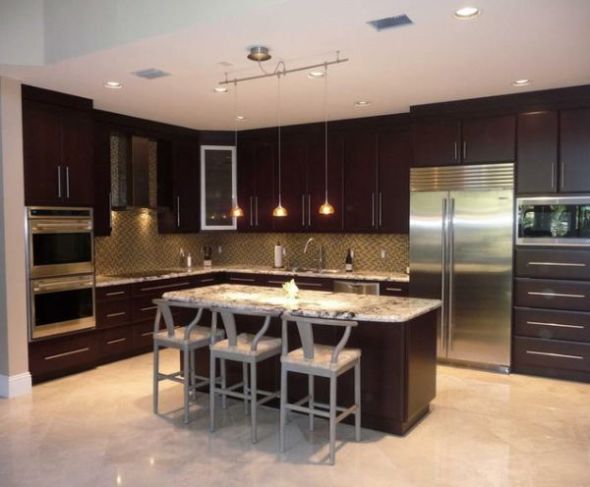 Earthy tones such as brown, peach and yellow are ideal color choices for Kitchen. Strong colors such as brick red also look nice in the kitchen.