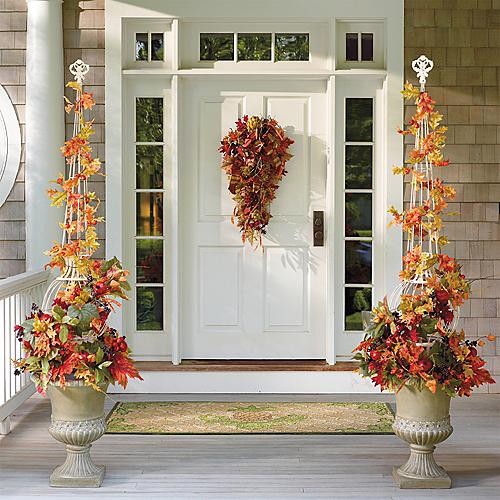 Decorate your home exterior with cornucopia of fresh decorating ideas. Be it Thanksgiving or Christmas a colorful flower arrangement can never go wrong.